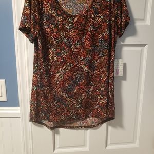 Lularoe very stretchy Size medium Classic Short Sleeve Top . NWT